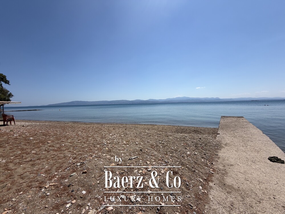 Eretria | Waterfront Villa with Private Beach and Marina image