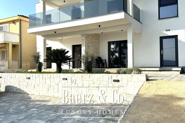 photo 3 Pašman, Neviđane, modern house in a new building with four separate apartments, first row by the...