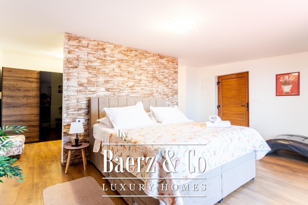 photo 8 Omiš, Stanići, a beautiful house with a sea view, total living area of 160 m² on a land plot of 2546