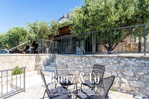 photo 25 Omiš, Stanići, a beautiful house with a sea view, total living area of 160 m² on a land plot of 2546