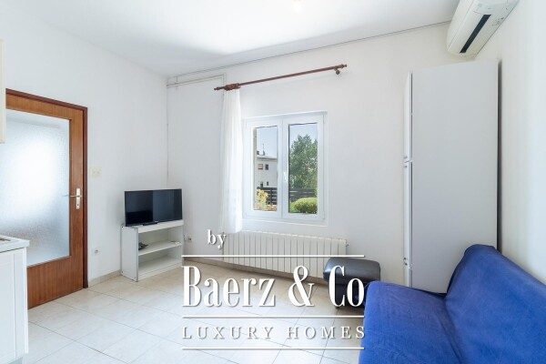 photo 19 Krk, house with three residential units and a large garden in the center