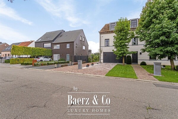 photo 42 Uitzonderlijke Duplex met zicht op kanaal, garage, carport en ruime (wijn)kelder!